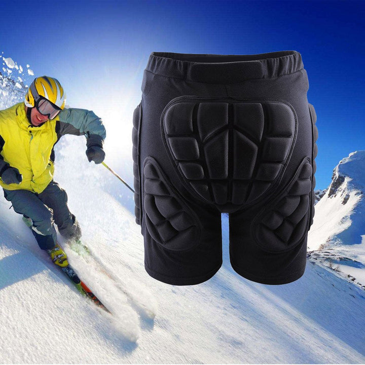 Protective padded shorts for snowboarding & skiing, featuring unisex design and comfortable impact absorption.