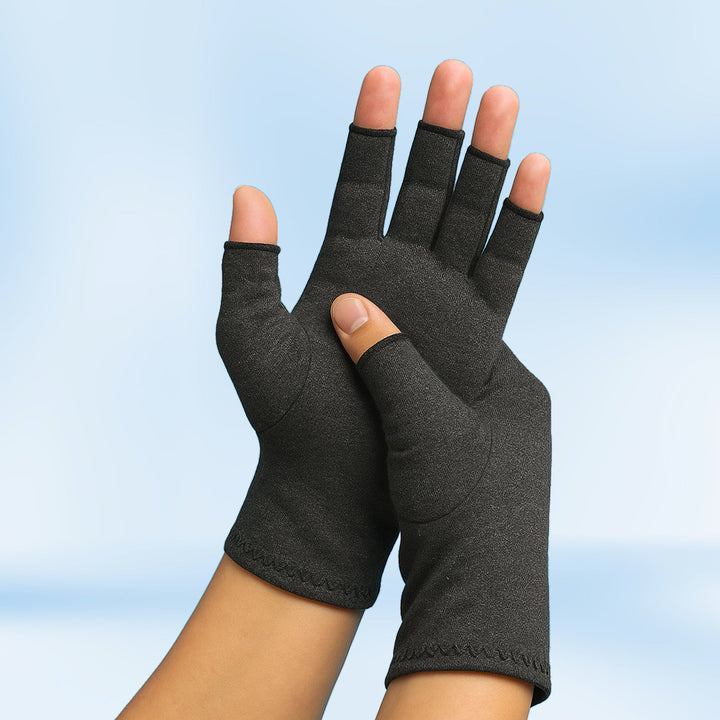 Therapeutic compression gloves for pain relief, designed to provide warmth and support for active hands & joints.