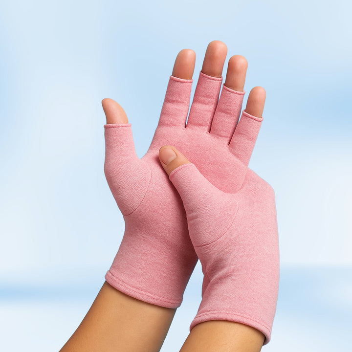 Comfortable heat compression gloves designed for men & women, aiding pain relief from arthritis & hand fatigue.