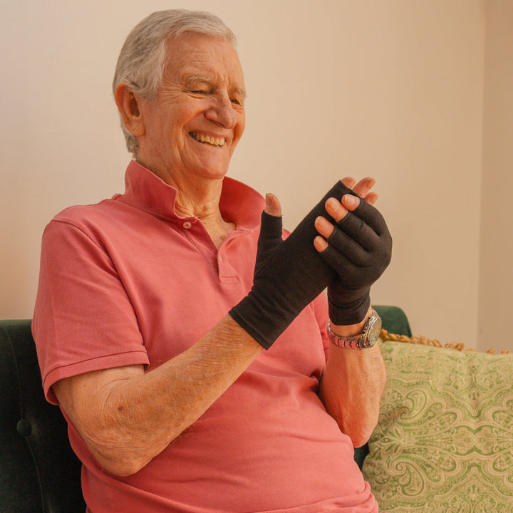 Unisex therapeutic heat compression gloves for arthritis & carpal tunnel pain relief. Hand support & warmth.