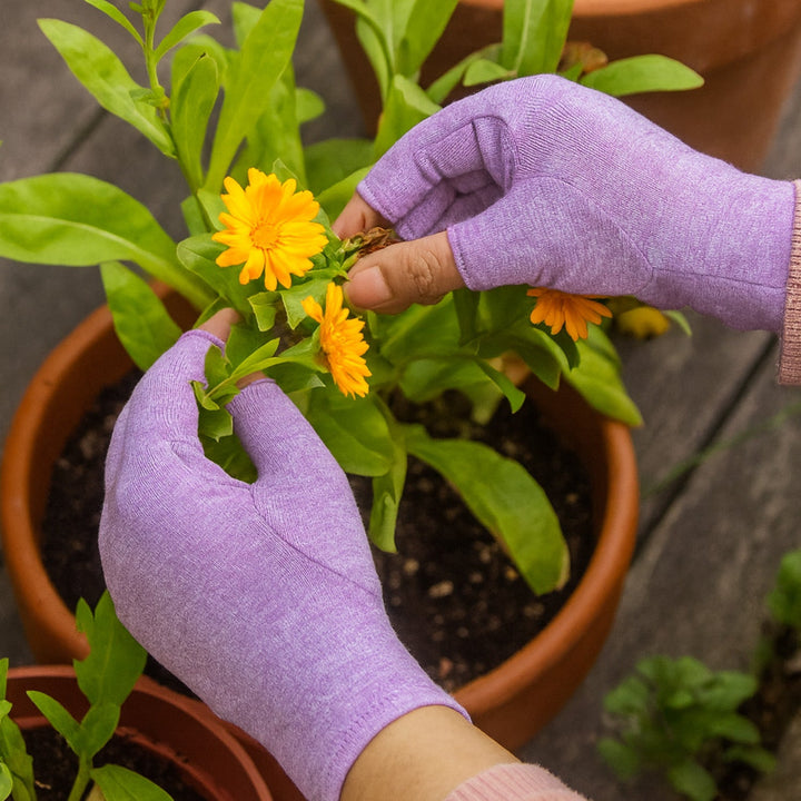 Therapeutic compression gloves for hands, featuring warmth and support for joint care and pain relief.