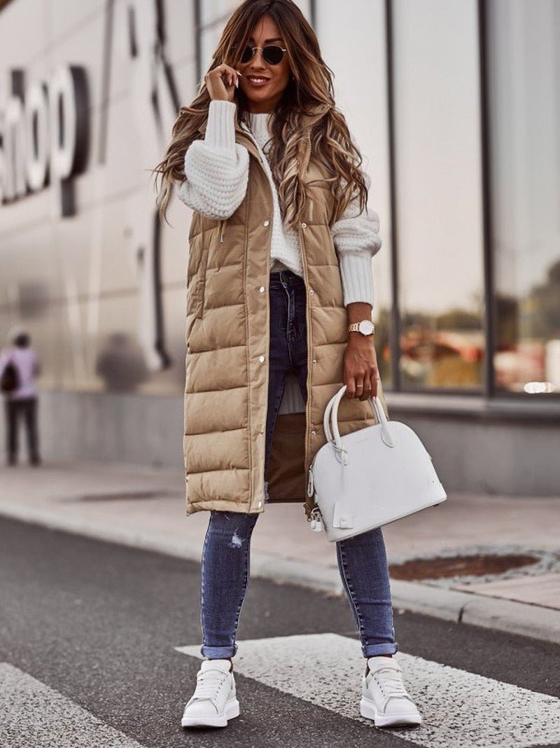 Women's knee-length black quilted puffer jacket, warm winter coat for cold weather outerwear.