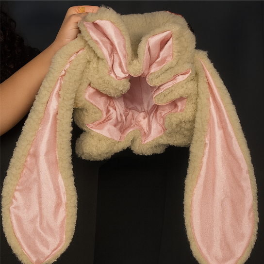 Fluffy plush women's bonnet, a warm & lined bunny hat perfect for cozy winter wear.