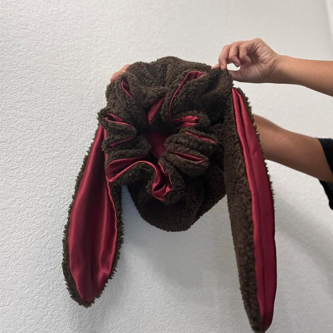 Stylish women's plush bunny bonnet, a cute & soft lined hat for winter fashion.