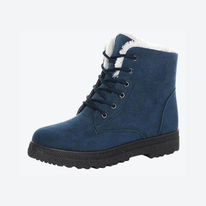 Women's black cozy winter snow boots, warm & stylish footwear for cold weather.