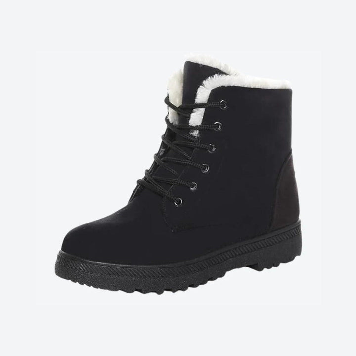 Fashion-forward women's black winter boots, versatile for any cold weather outfit.