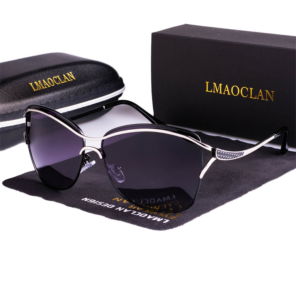 Women's luxury polarized sunglasses, stylish black frame, for glare-free vision & UV protection.