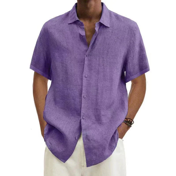 Close-up of men's classic button down shirt details: clean collar, buttons, & comfortable fabric.
