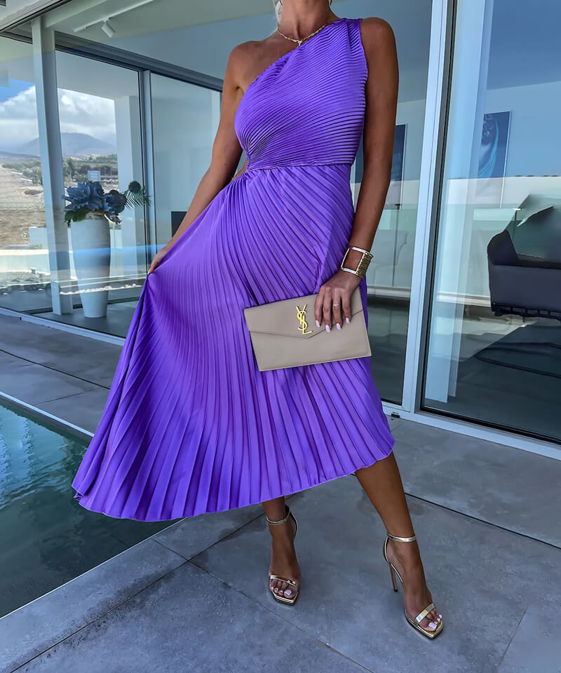 Chic asymmetrical pleated maxi dress for women, ideal as an evening gown or occasion wear.