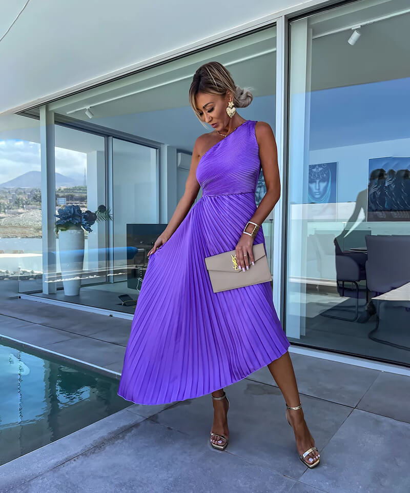 Flowing pleated one-shoulder maxi dress, a stunning formal gown for special events.