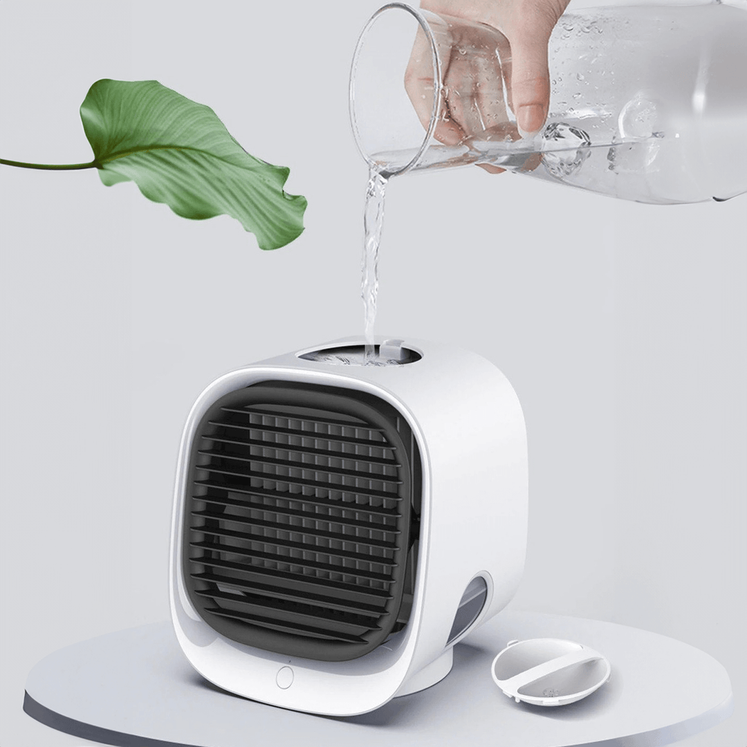 Portable USB air conditioner, personal cooler & fan for home, office, or car, ensuring cool comfort.