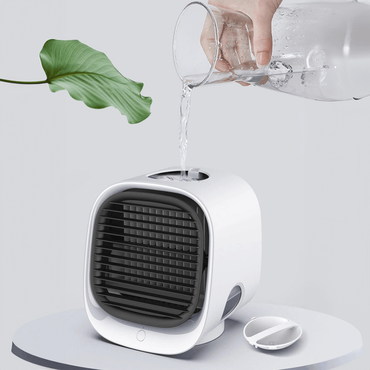 Portable USB air conditioner, personal cooler & fan for home, office, or car, ensuring cool comfort.