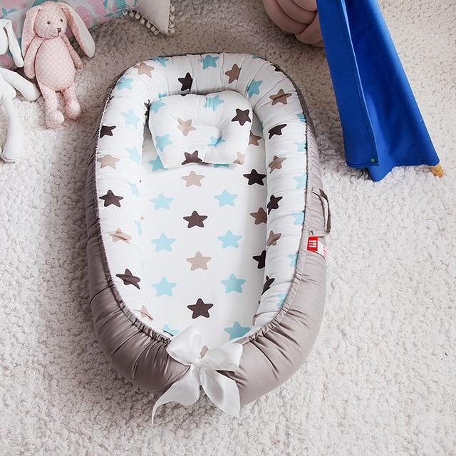 Lightweight portable baby lounger, an infant nest perfect for travel and home use.