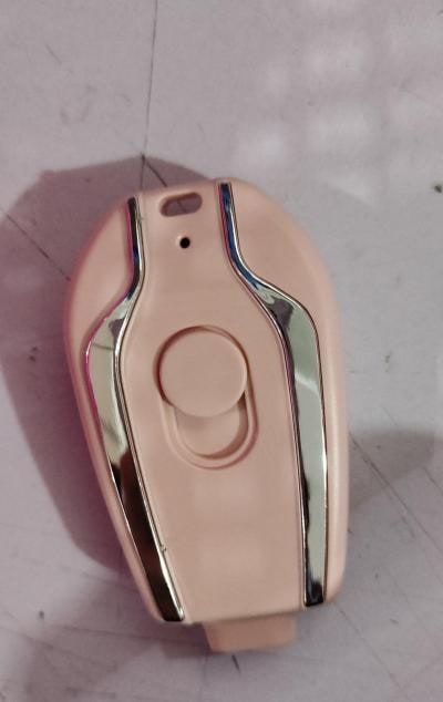 Retractable Type-C connector keychain power bank, ultra-portable.