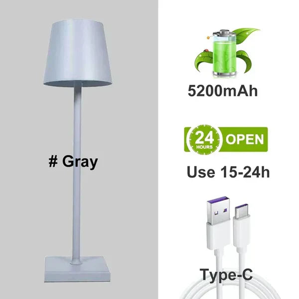 Compact dimmable LED table lamp, USB rechargeable. Provides modern ambient light for home, office, study.