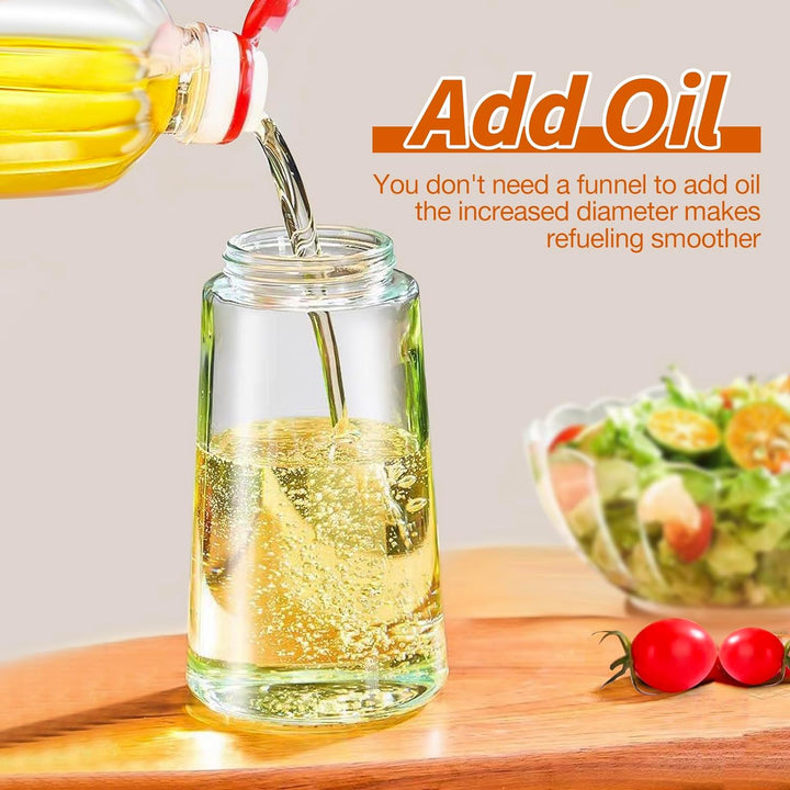 Stylish glass 2-in-1 olive oil dispenser & mister, ideal for kitchen, grilling, and salad use.