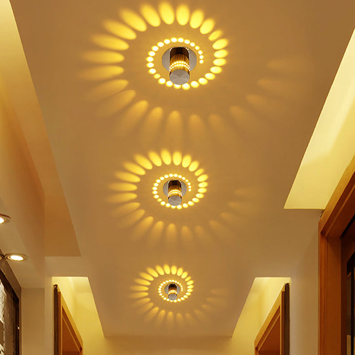 Decorative LED spiral ceiling light fixture, creating a unique ambient glow. Stylish and energy-saving design.