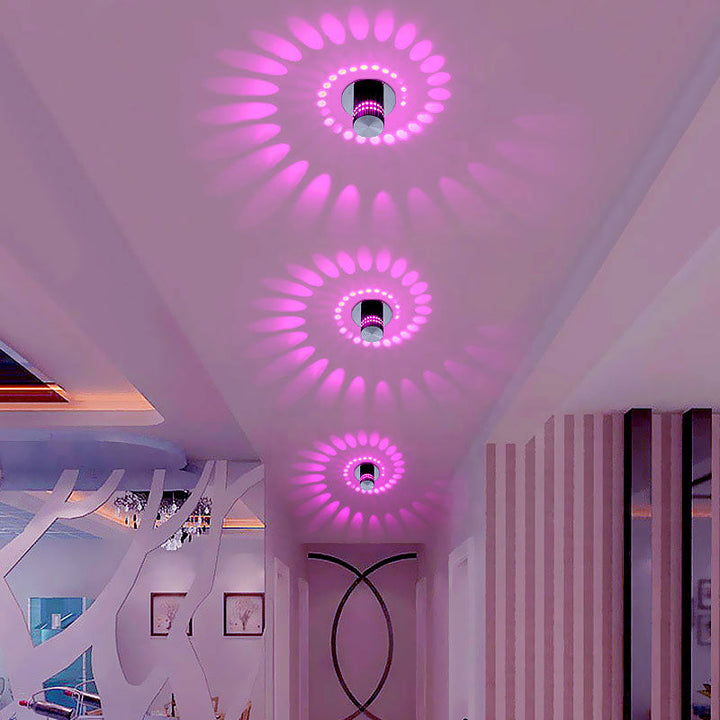 Modern spiral LED wall light fixture, adding decorative ambiance to any room. Energy-efficient home decor.