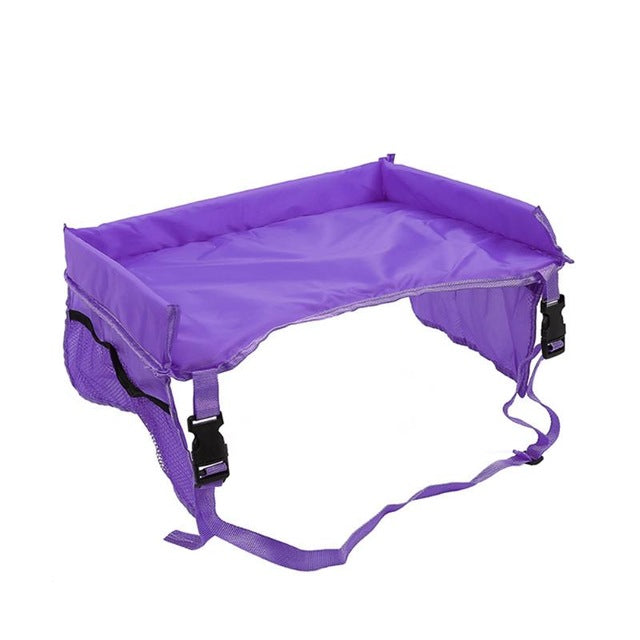 Portable kids' snack & play tray with side pockets for car, train, plane travel. Easy-clean surface for meals.