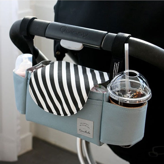 Unisex diaper organizer pram bag with adjustable dividers, perfect for keeping baby essentials tidy on the go.