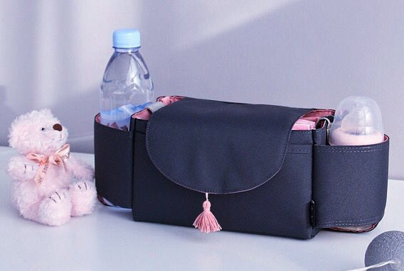 Adjustable diaper organizer pram bag, ideal for busy parents to carry baby necessities conveniently.