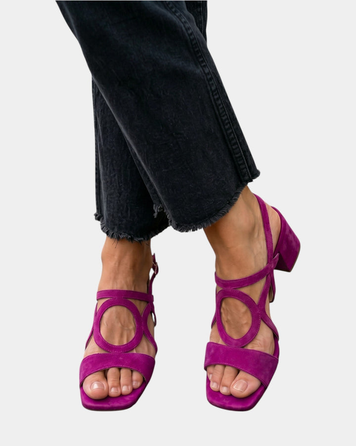 Elegant women's vibrant strappy block heel sandals, adding a touch of fashion to any summer look.