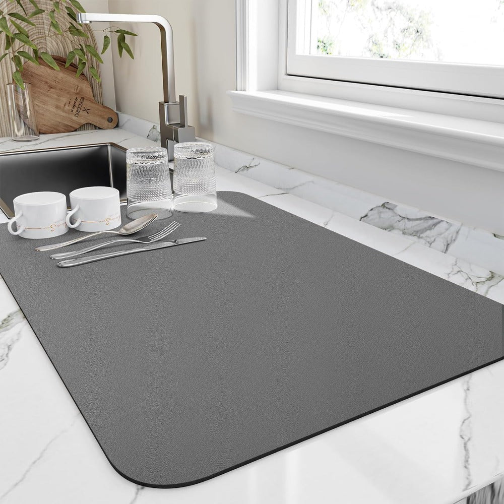 Sleek quick-dry kitchen dish mat. Ultra-absorbent diatomite counter mat for hygienic dish drying.