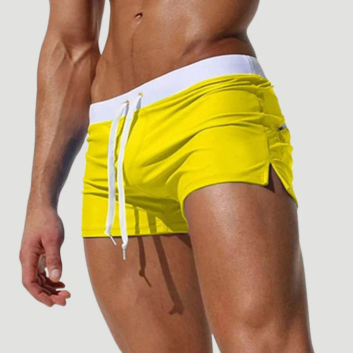 Stylish men's quick-dry swim shorts, ideal for vacation, water sports, or active beach days.
