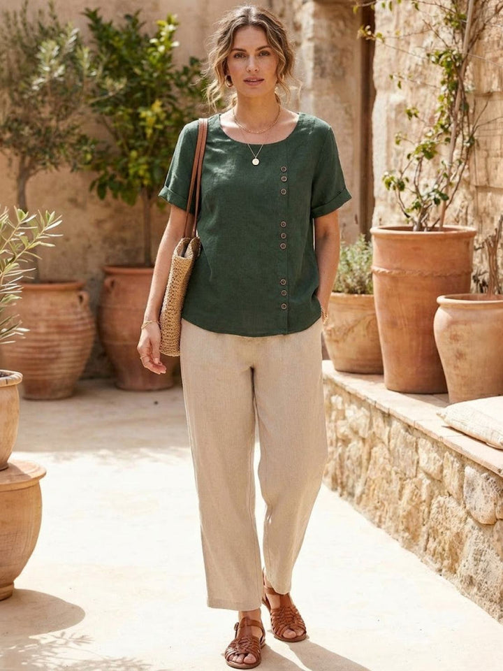 Casual short sleeve top for women, scoop neck & button detail, perfect for summer fashion.