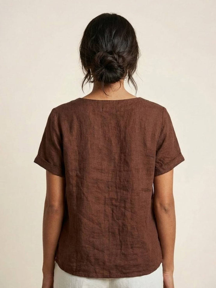 Relaxed fit short sleeve women's top, scoop neck & button detail, great for comfort.