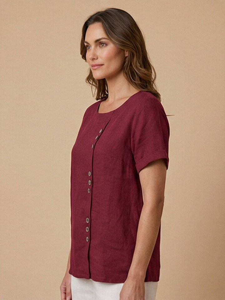 Comfortable women's short sleeve top, scoop neck, button detail, ideal for summer.