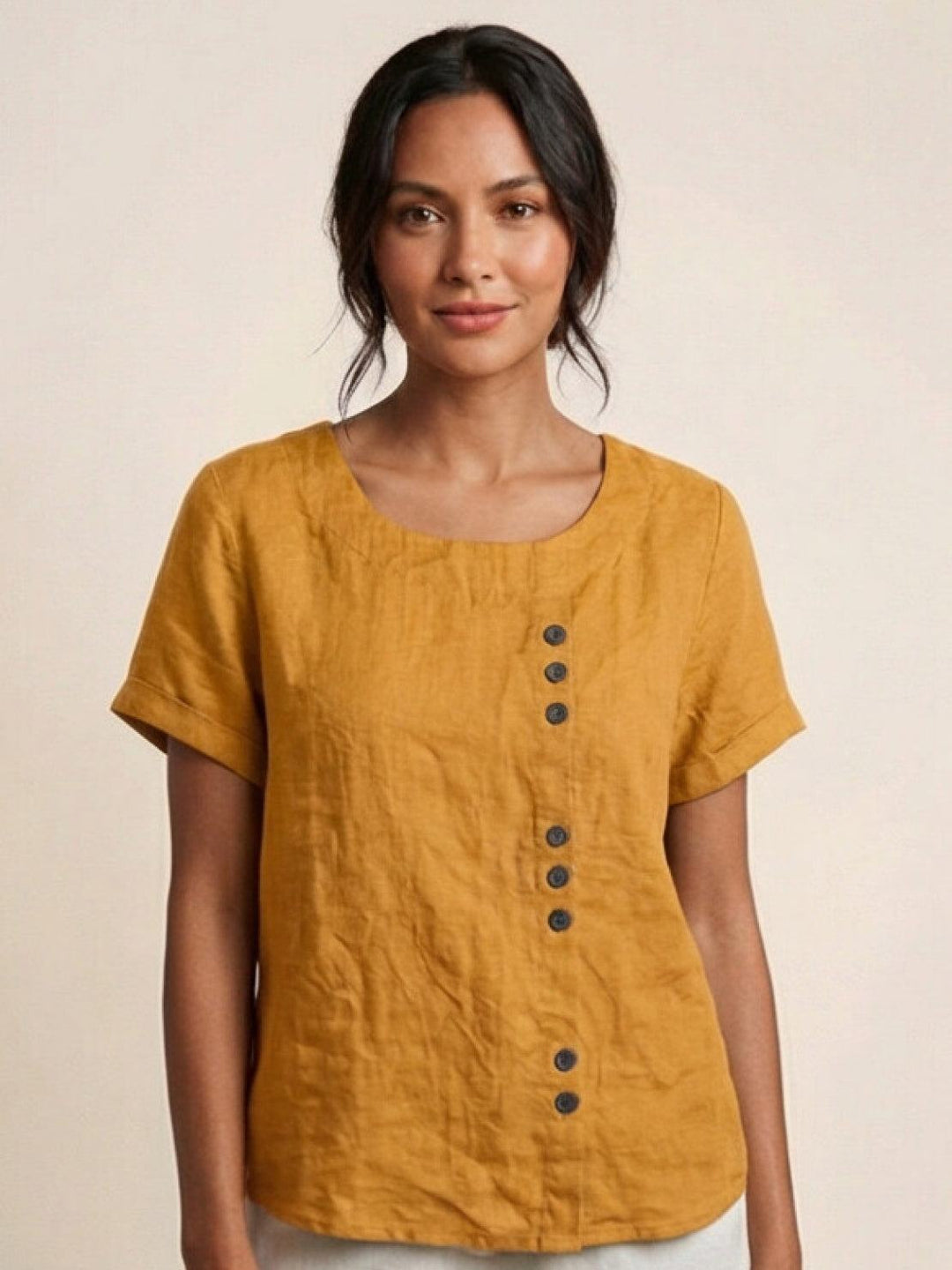 Chic women's short sleeve top, casual design, scoop neck, and stylish button detail.