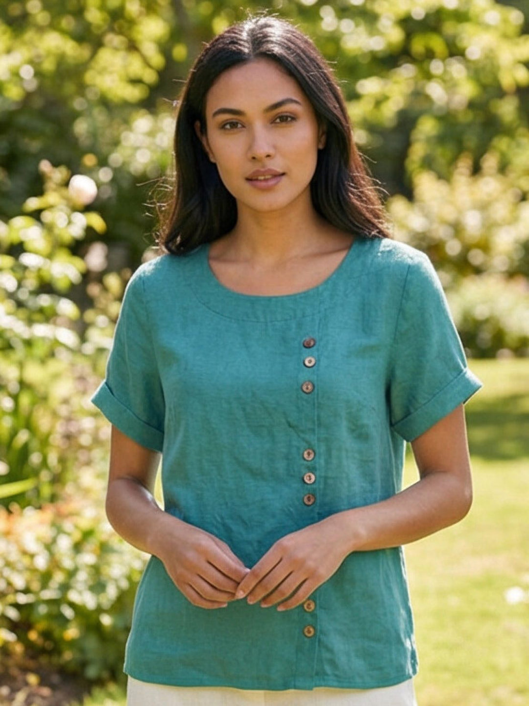Summer style women's tee, short sleeve, scoop neck, and chic button details.