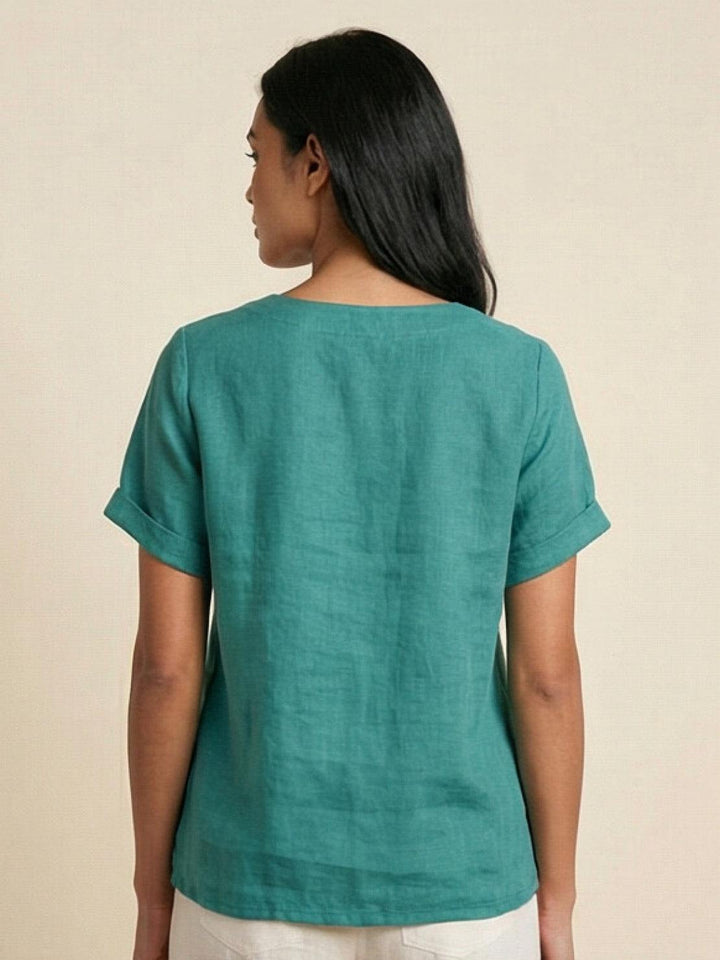 Women's comfortable short sleeve top, casual, scoop neck, and stylish button accents.
