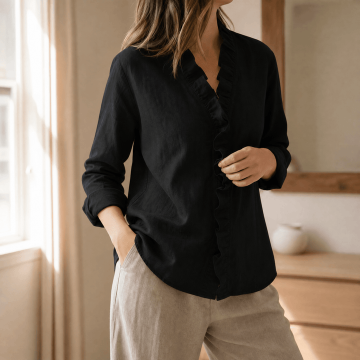 Graceful women's top: a long sleeve blouse with a sophisticated ruffle V-neck, perfect for spring/fall.
