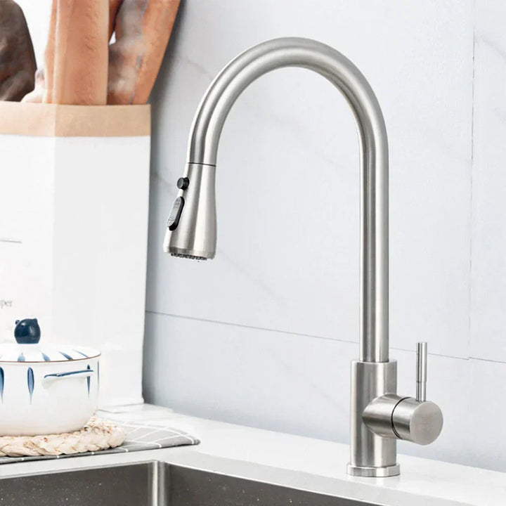 Matte black kitchen faucet with pull-down sprayer, single lever, and retractable hose.