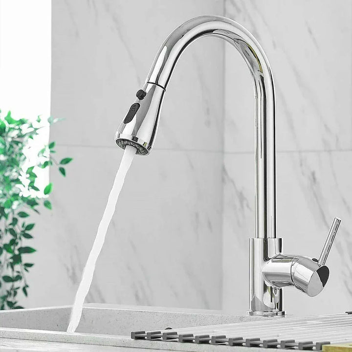 Brushed nickel kitchen faucet, pull-down sprayer, single lever mixer for modern kitchens.