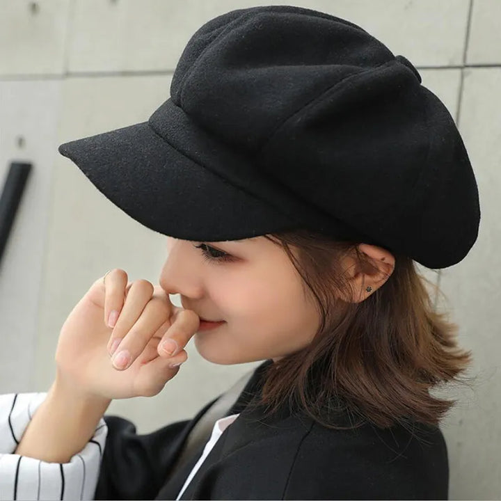Women's retro cotton balloon hat, vintage style winter fashion accessory.
