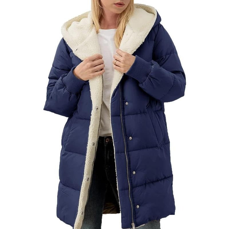 Women's reversible hooded jacket, Nina, offering dual-sided style and warmth for winter outerwear.