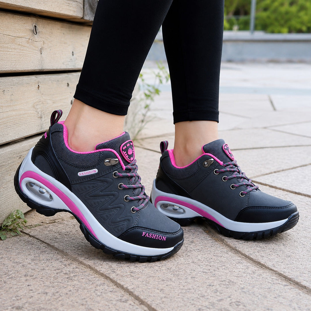 Athletic women's Ridge waterproof outdoor sneakers, offering comfort, durability & anti-slip performance.