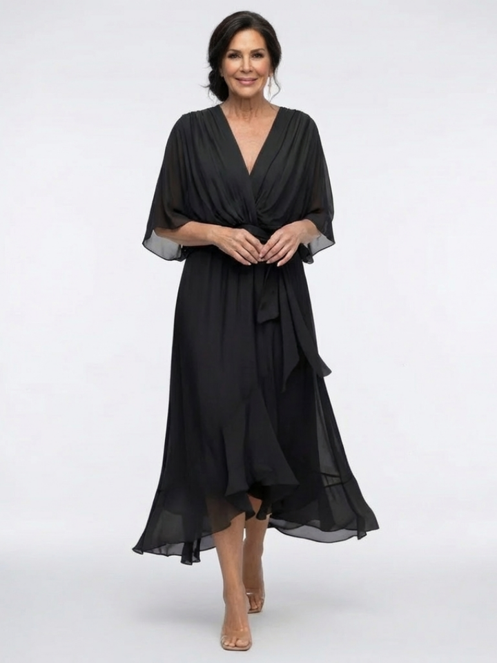 A stylish women's draped dress with a flattering waist tie, offering an elegant and chic midi length for women.