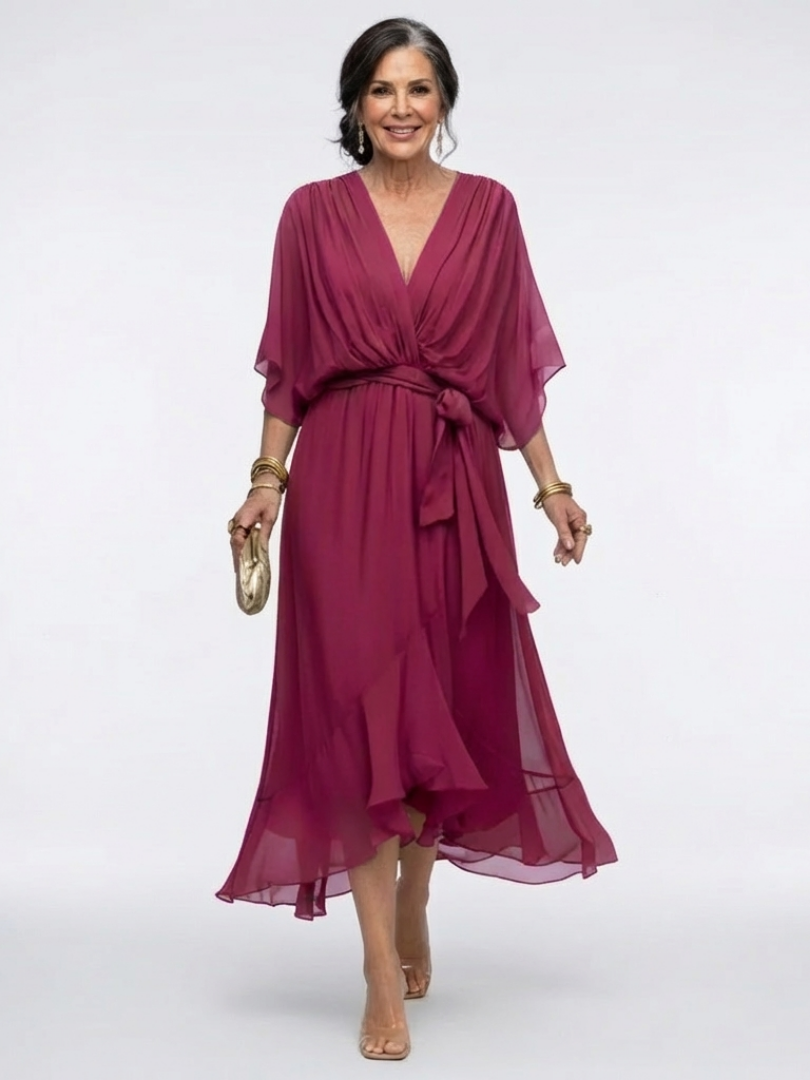 Modern women's midi dress featuring a beautiful draped design, a defining waist tie, and comfortable short sleeves.
