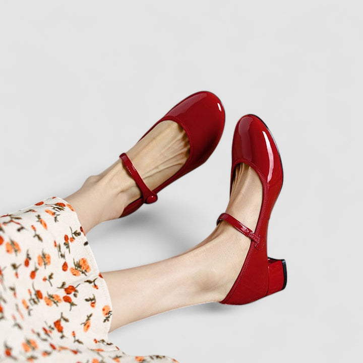 Black women's block heel Mary Jane pumps, ideal for office, formal wear, & sophisticated dress shoes.