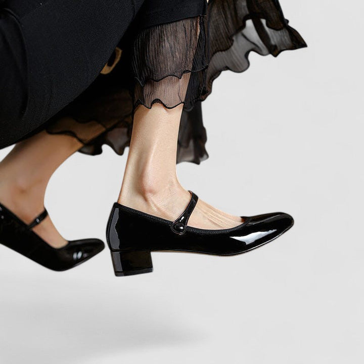 Classic comfortable women's Mary Jane shoes with a sturdy block heel and adjustable ankle strap.