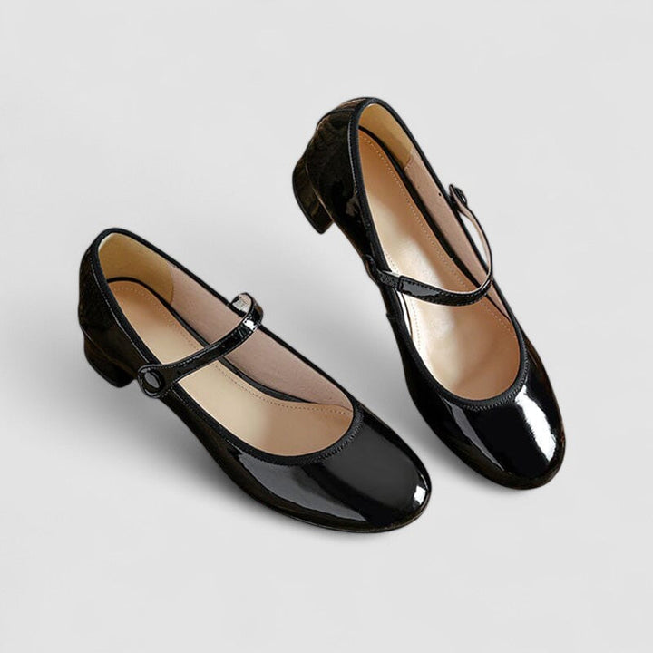 Chic women's block heel Mary Jane shoes with an ankle strap, blending classic design with modern comfort.