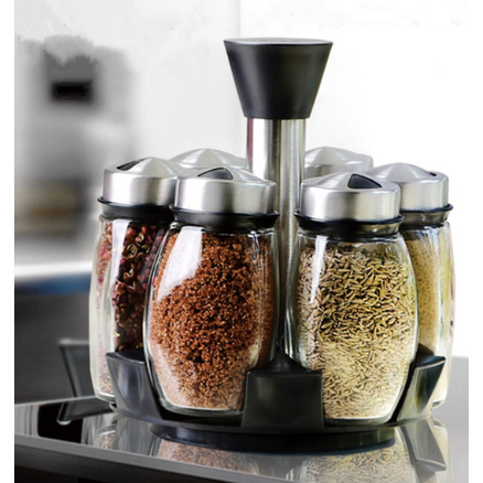 Stylish rotating spice rack, ideal for any home kitchen, featuring 6 glass jars for all your favorite herbs.