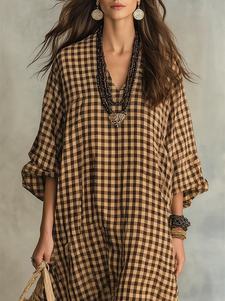 Oversized women's gingham maxi dress with V-neck & bishop sleeves; comfortable, flowy & perfect for summer.