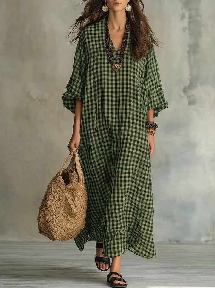 Effortless women's gingham maxi dress, a casual and flowy summer staple with V-neck and bishop sleeves.