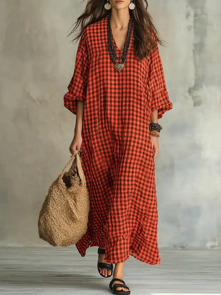 Stylish women's gingham maxi dress, oversized & flowy with V-neck and bishop sleeves; perfect for casual summer days.