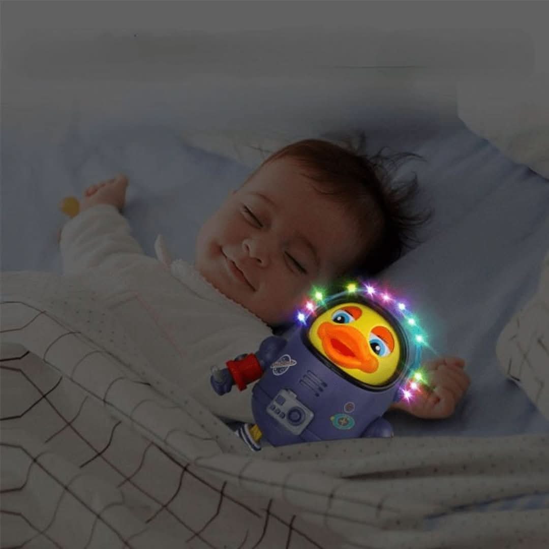 Fun dancing duck toy, lights up & plays music, encouraging interactive play for young children.